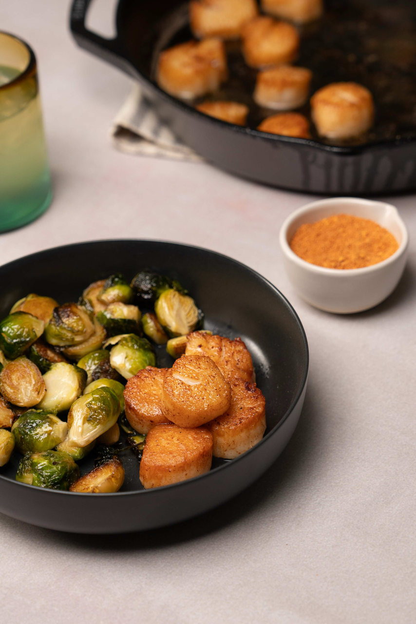 Caribbean Coconut Grilled Scallops with Brown Butter and Brussel Sprou
